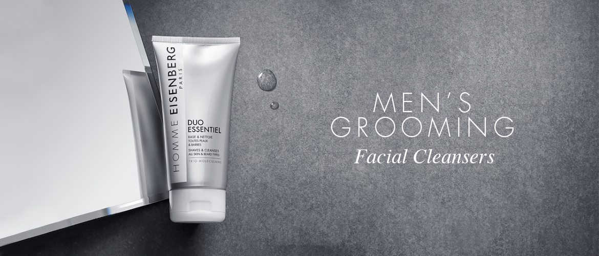 facial cleanser for men on a mirror and a grey chalk background